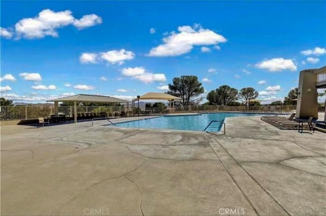 view of pool featuring a gazebo and a patio area