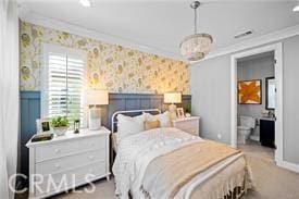 bedroom with light colored carpet and ornamental molding