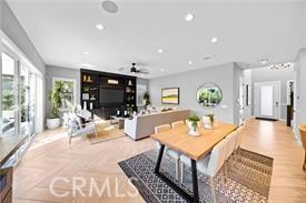 dining area featuring ceiling fan and light wood-type flooring