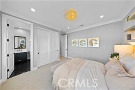 bedroom with ornamental molding