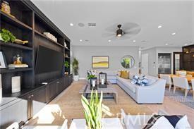 living room featuring ceiling fan