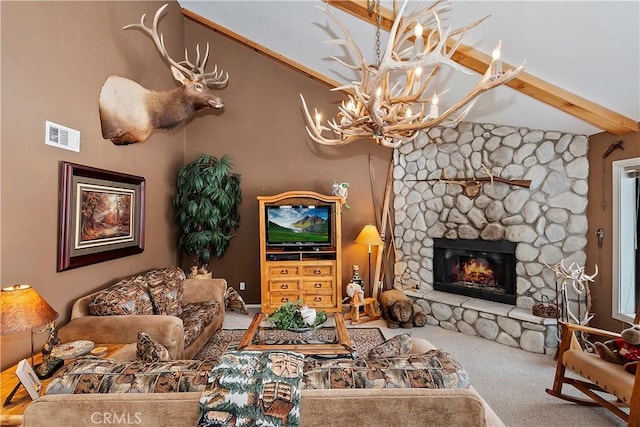 carpeted living room with a fireplace, a chandelier, and beamed ceiling