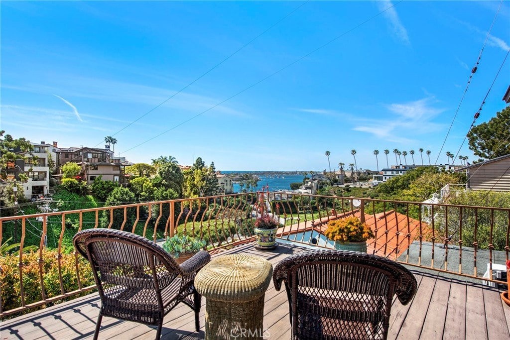 deck featuring a water view