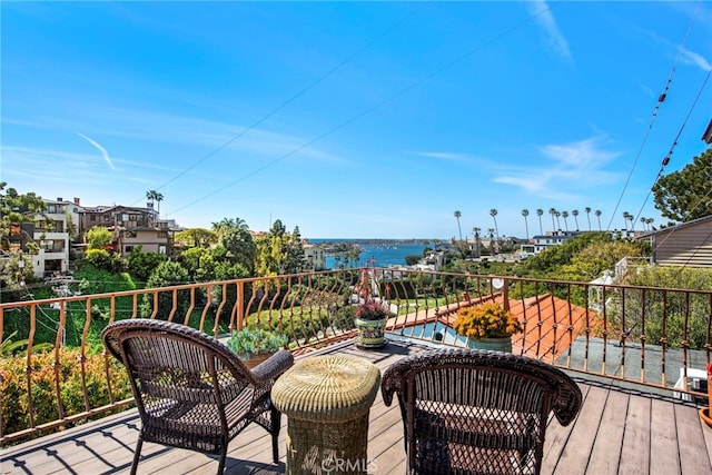 deck featuring a water view