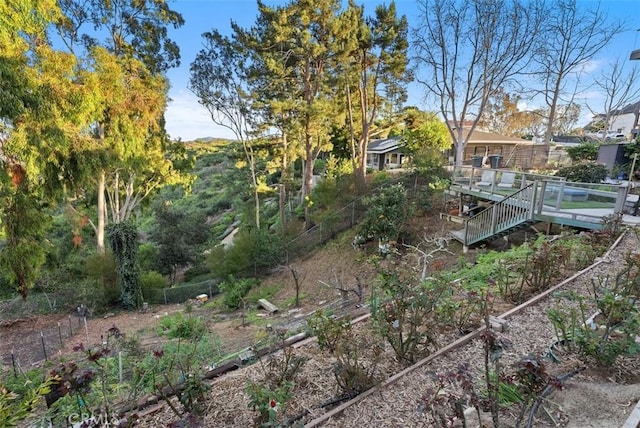 view of yard featuring a wooden deck