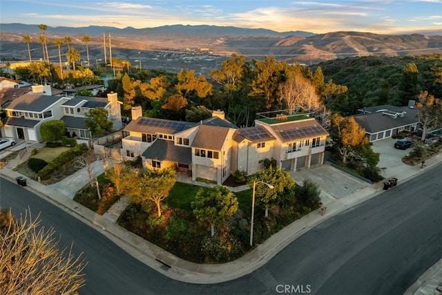 aerial view at dusk with a mountain view