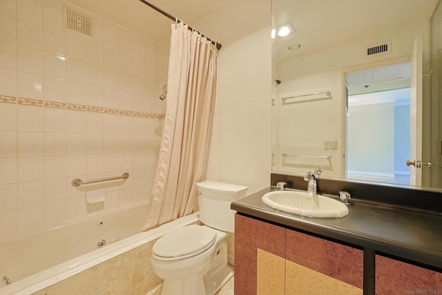 full bathroom featuring vanity, shower / tub combo, and toilet