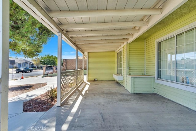 view of patio featuring a porch