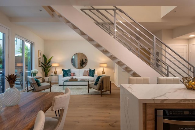 living room with light hardwood / wood-style floors