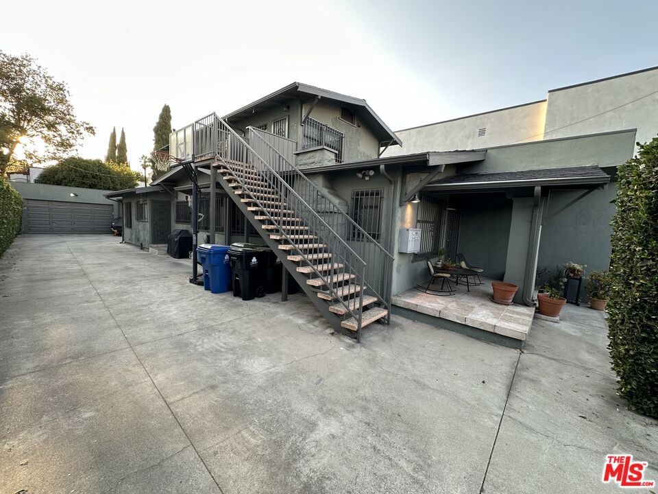 back of property with a patio area