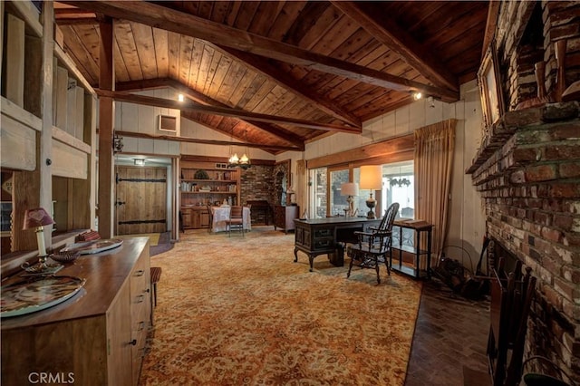 interior space featuring wood ceiling, wooden walls, a brick fireplace, and vaulted ceiling with beams