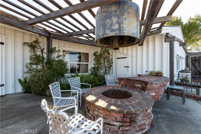 view of patio featuring a fire pit