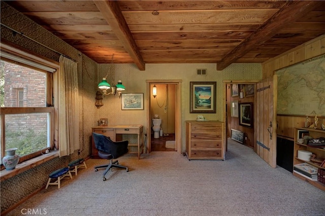 interior space featuring wood ceiling, carpet, and beamed ceiling