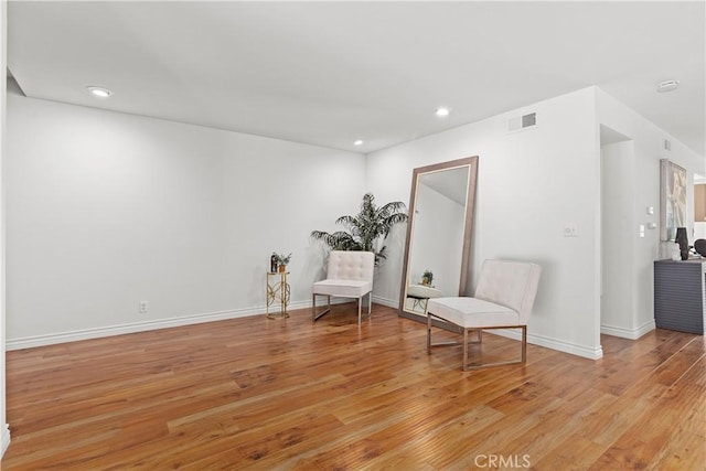 unfurnished room with light hardwood / wood-style floors