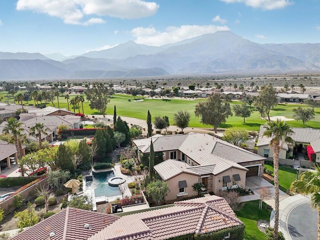 drone / aerial view featuring a mountain view