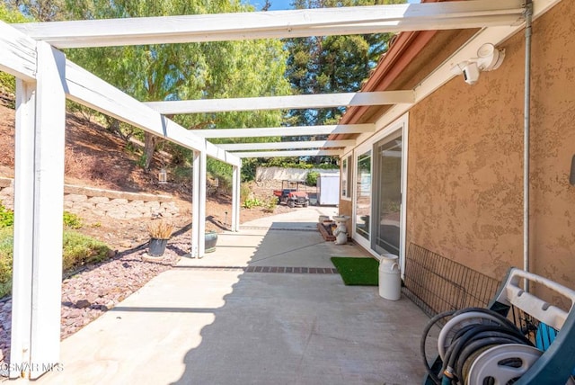 view of patio with a pergola