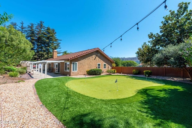 view of yard featuring a patio and a pergola