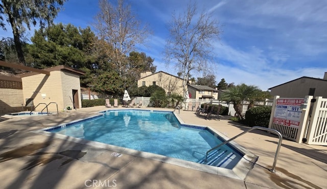 view of pool with a patio area