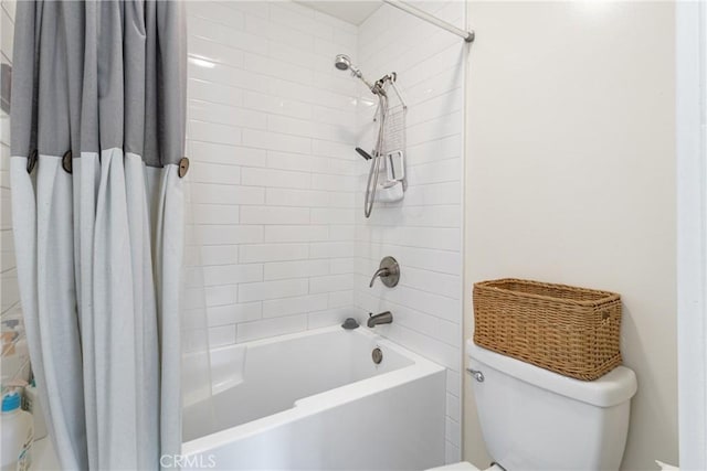 bathroom featuring toilet and shower / bath combo with shower curtain