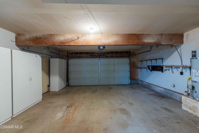 garage featuring a garage door opener and water heater