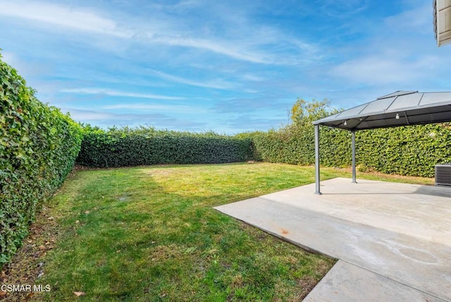 view of yard with a gazebo and a patio area