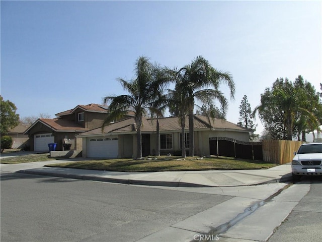 ranch-style house featuring a garage