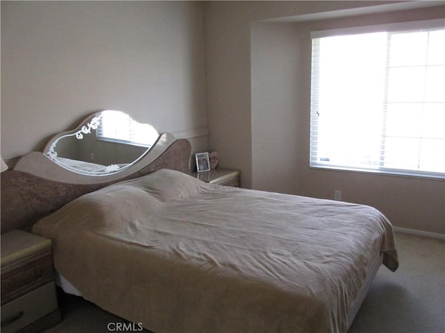 bedroom featuring carpet floors