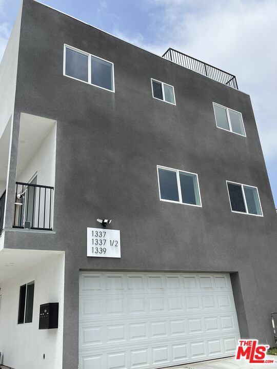 view of property exterior featuring a garage