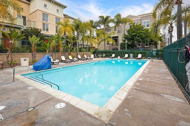 view of pool featuring a patio area