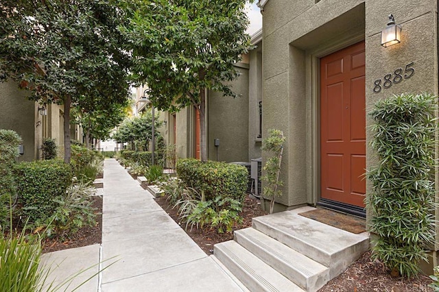 property entrance featuring central air condition unit