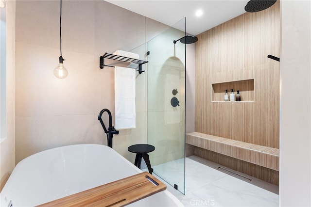 bathroom featuring a tile shower