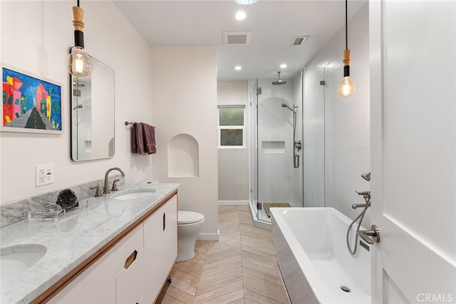 full bathroom featuring vanity, toilet, tile patterned flooring, and plus walk in shower