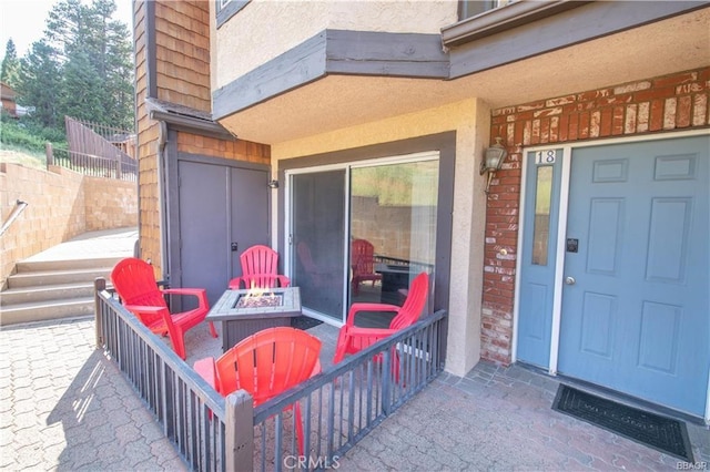 property entrance with a patio area