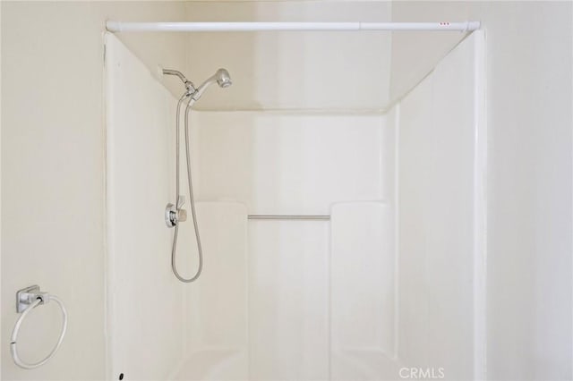 bathroom with walk in shower