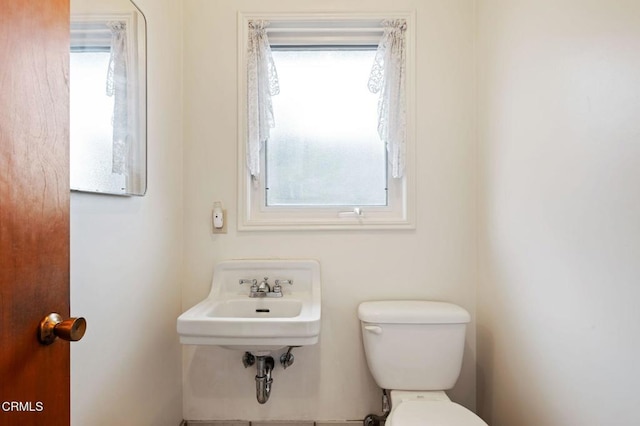 bathroom featuring sink and toilet