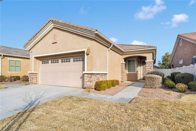 view of front of property featuring a garage and a front yard