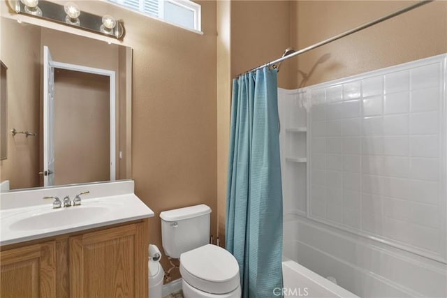 full bathroom featuring vanity, toilet, and shower / tub combo with curtain