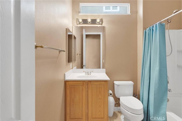 full bathroom with vanity, shower / bath combination with curtain, and toilet