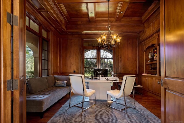 sitting room featuring crown molding, wood ceiling, wooden walls, a notable chandelier, and dark hardwood / wood-style flooring