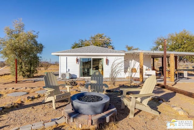 view of patio / terrace featuring an outdoor fire pit