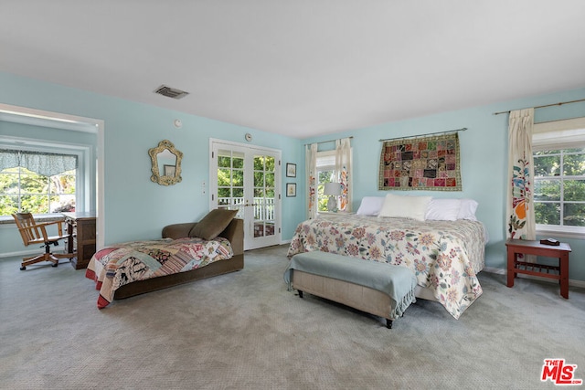 bedroom featuring carpet floors, access to exterior, and french doors