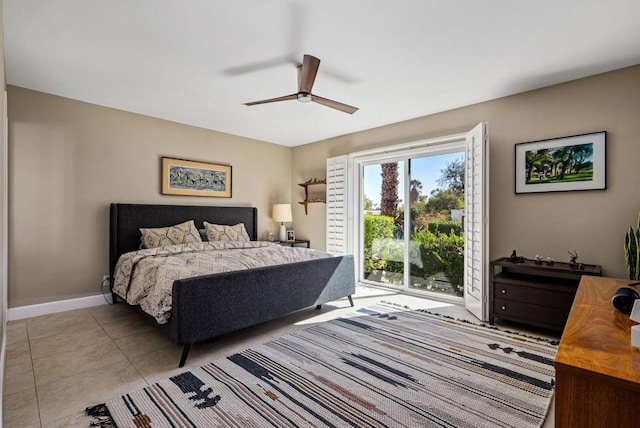 tiled bedroom with ceiling fan and access to exterior