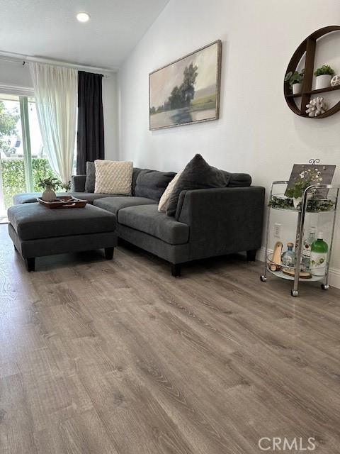 living room with hardwood / wood-style flooring