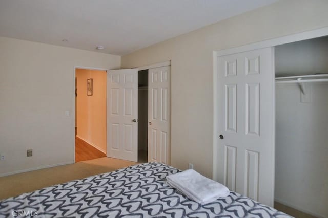 bedroom featuring two closets