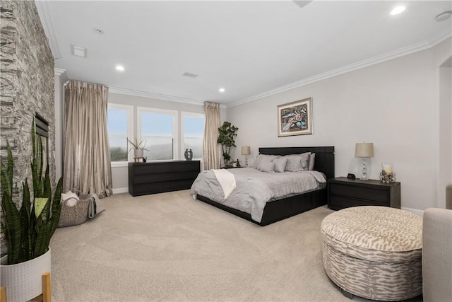 bedroom featuring ornamental molding and carpet floors