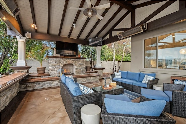 view of patio with a gazebo, ceiling fan, and an outdoor living space with a fireplace