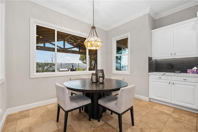 dining area with ornamental molding