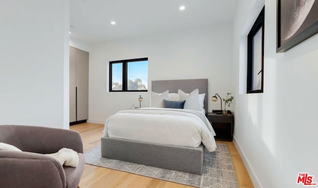 bedroom featuring light hardwood / wood-style flooring