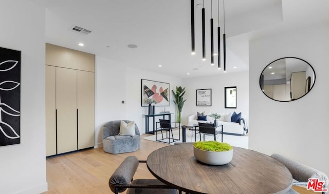 dining room featuring light hardwood / wood-style flooring