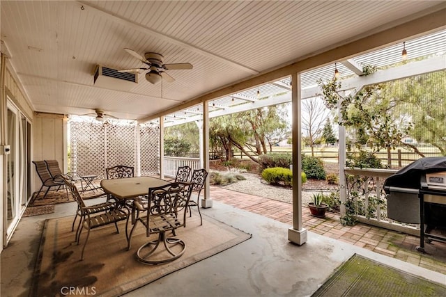 view of patio featuring a grill and ceiling fan